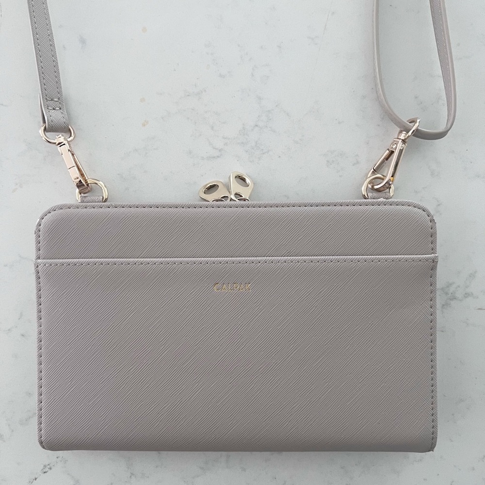 CALPAK Kaya travel wallet with removable crossbody strap taupe